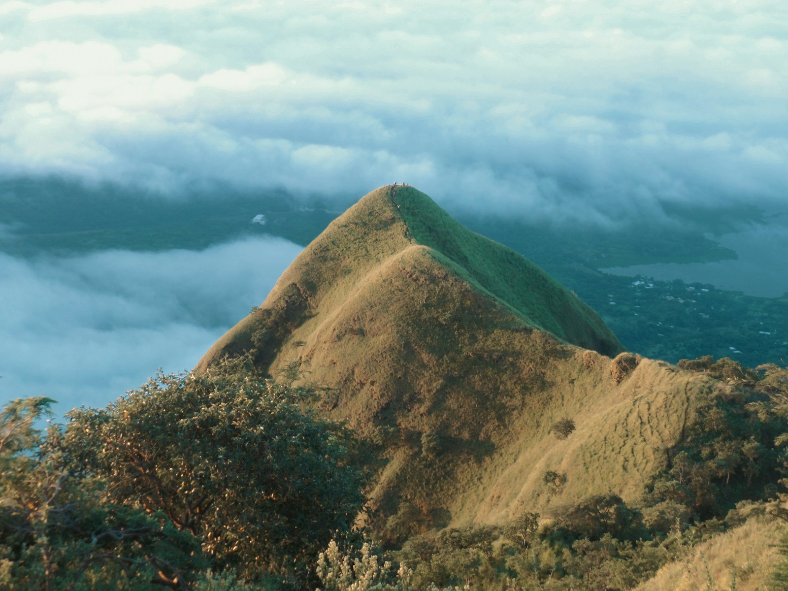 brown mountain under blue sky during daytime